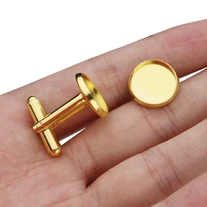 Macro view of rose gold round cufflink bases for DIY jewelry making and craft projects