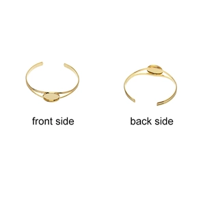 Detail van de verzilverde DIY armbandbasis met ovale lade voor het maken van sieraden