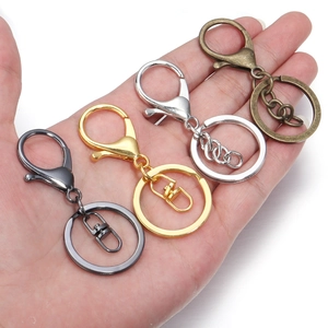 Zinc alloy lobster clasp keychain set in gold, silver, bronze and gun black finishes