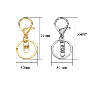 Golden and silver metal lobster clasp keychains with ring and size measurements