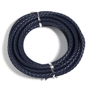 Macro shot of 6mm dark blue braided PU leather cord roll for DIY jewelry making