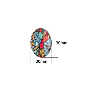 Ovaler Glas-Cabochon 20x30mm mit bunten abstrakten Pfauenfedermustern für DIY-Schmuck