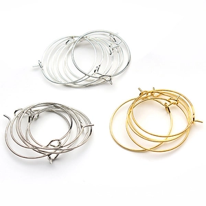 Detail of DIY hoop earrings in gold, silver, and platinum finishes with hook closures
