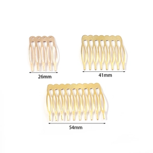 Detailed view of three sizes of gold-tone metal hair combs for DIY bridal headpiece making