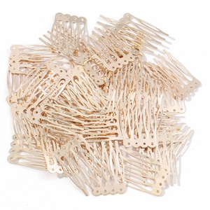 Pile of golden metal 10-tooth hair combs for DIY bridal headpiece accessories