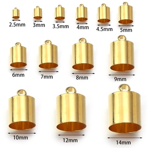Matrix display of gold copper tassel caps and cord ends in 13 sizes from 2.5mm to 14mm