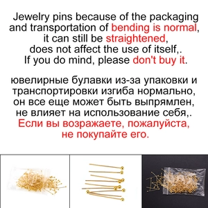 Macro detail of golden ball pins for jewelry making showing DIY handmade craft components