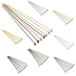 Detail of round head ball pins in various metal finishes for DIY jewelry making crafts