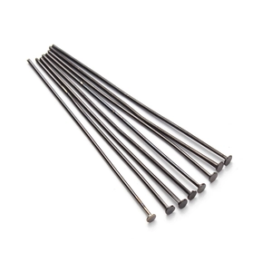 Detailed macro view of 10 black metal head pins for DIY jewelry making accessories