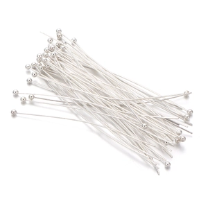 Macro shot of silver plated copper ball head pins for DIY jewelry making accessories