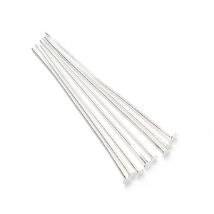 Radial arrangement of silver flat head T-pins for DIY jewelry making and beading projects