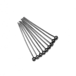 Macro shot of ten gunmetal grey copper ball head pins for professional DIY jewelry making