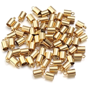 Golden stainless steel tassel caps and cord end connectors for jewelry making on white background