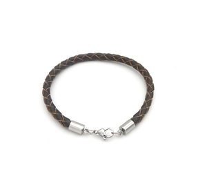 Close-up of brown braided leather bracelet with silver-tone cylindrical lobster clasp