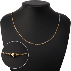 Gold plated stainless steel cable chain necklace on a black bust with detail view