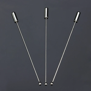 Detailed view of silver polished metal safety lapel pins with round cylinder caps