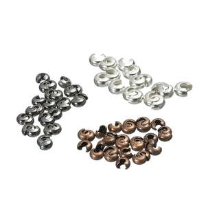 DIY Schmuck Quetschperlen Abdeckungen in Schwarz, Silber und Bronze auf weißem Grund
