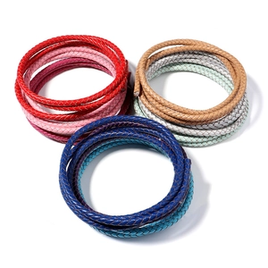 Detail of 6mm braided leather cords in vibrant colors for DIY bracelet making