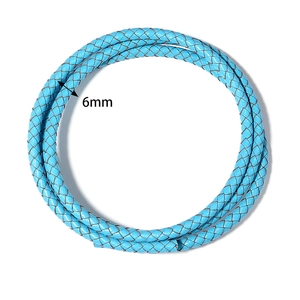 Close-up of 6mm bright blue braided leather cord for DIY jewelry and bracelet making