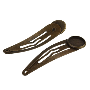 Close-up of bronze DIY hair clip with round base for jewelry and craft supplies