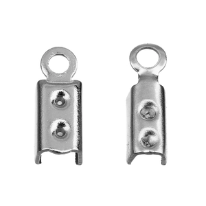Detail of silver stainless steel cord end crimps with loops for DIY jewelry making
