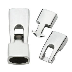 Close-up of silver stainless steel magnetic clasp with brushed and mirror polished finish