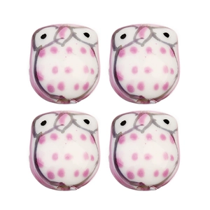 Vue détaillée de 4 perles de chouette en céramique peintes à la main pour création bijoux