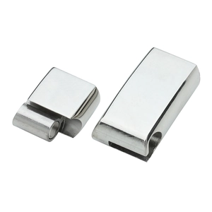 Close-up of polished stainless steel magnetic clasps with a rectangular side-slide mechanism