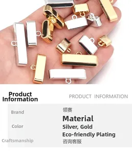 Detailed view of silver and gold alloy barrel end caps for DIY jewelry making and crafts