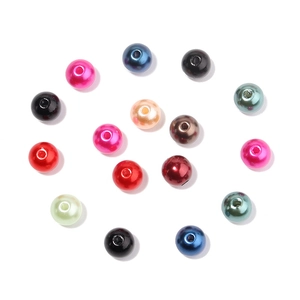 Macro shot of colorful ABS faux pearls with pre-drilled holes for DIY jewelry making