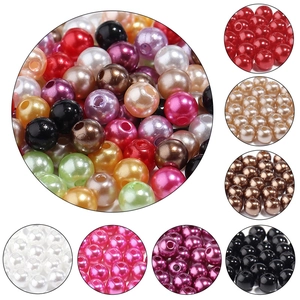 Detailed view of colorful ABS round faux pearl beads with holes for DIY jewelry making