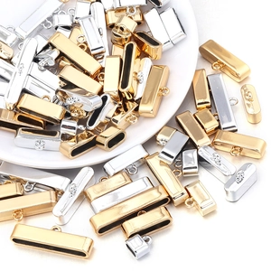 Macro shot of gold and silver plated metal slide end clasps for DIY jewelry making