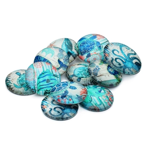 Ocean theme glass cabochons with sea turtle and octopus patterns in blue and teal