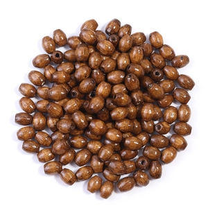 Deep walnut oval wooden beads with natural grain for DIY jewelry and necklace making