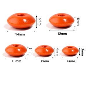 Flat lay of bright orange wooden abacus beads in five different sizes for DIY jewelry making
