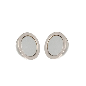 Macro detail of silver round magnetic clasps for DIY jewelry making and necklaces