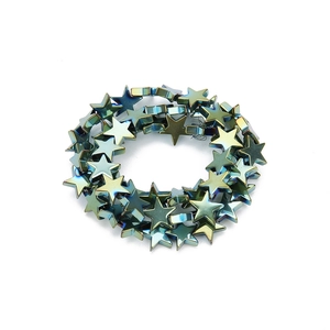 Macro shot of iridescent pentagram hematite loose beads for DIY jewelry making