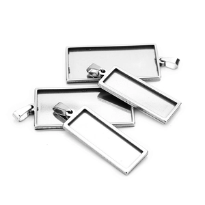 Macro detail of rectangle stainless steel pendant trays for DIY jewelry making