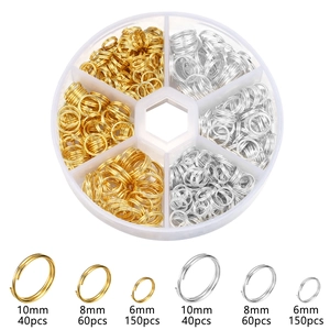 DIY jewelry kit with gold and silver split rings in a six-compartment plastic organizer