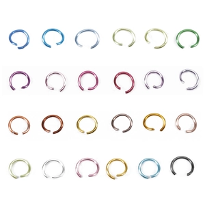 24-color aluminum open jump rings in a grid layout for DIY jewelry making and crafts