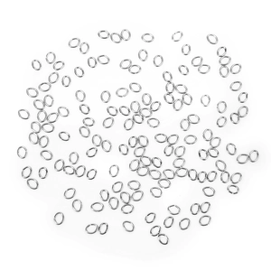 Macro shot of silver stainless steel oval jump rings for DIY jewelry making connections