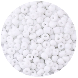 Macro detail of uniform white glass seed beads for DIY jewelry and handmade bracelets