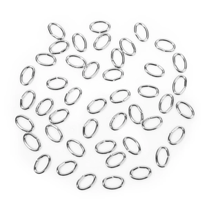 Macro detail of oval stainless steel jump rings for DIY jewelry making and connectors
