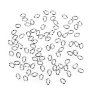 Macro shot of silver stainless steel oval jump rings for DIY jewelry making and crafts