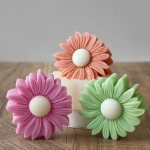 Macro detail of multi-layered daisy silicone mold in pink orange and green colors