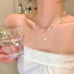 Elegant double-layered star pendant necklace for women featuring zirconia crystals