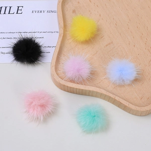 Colorful plush mink fur balls in six vibrant colors for DIY crafts and accessories