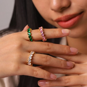 Stackable 18k gold plated titanium rings with green, pink and white cubic zirconia stones