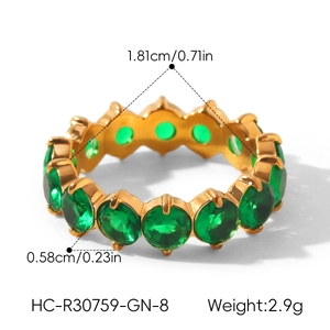 Detailed view of 18k gold plated ring with green zircon stones and sizing dimensions
