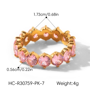 Macro detail of 18k gold plated ring featuring pink zircon stones with size dimensions